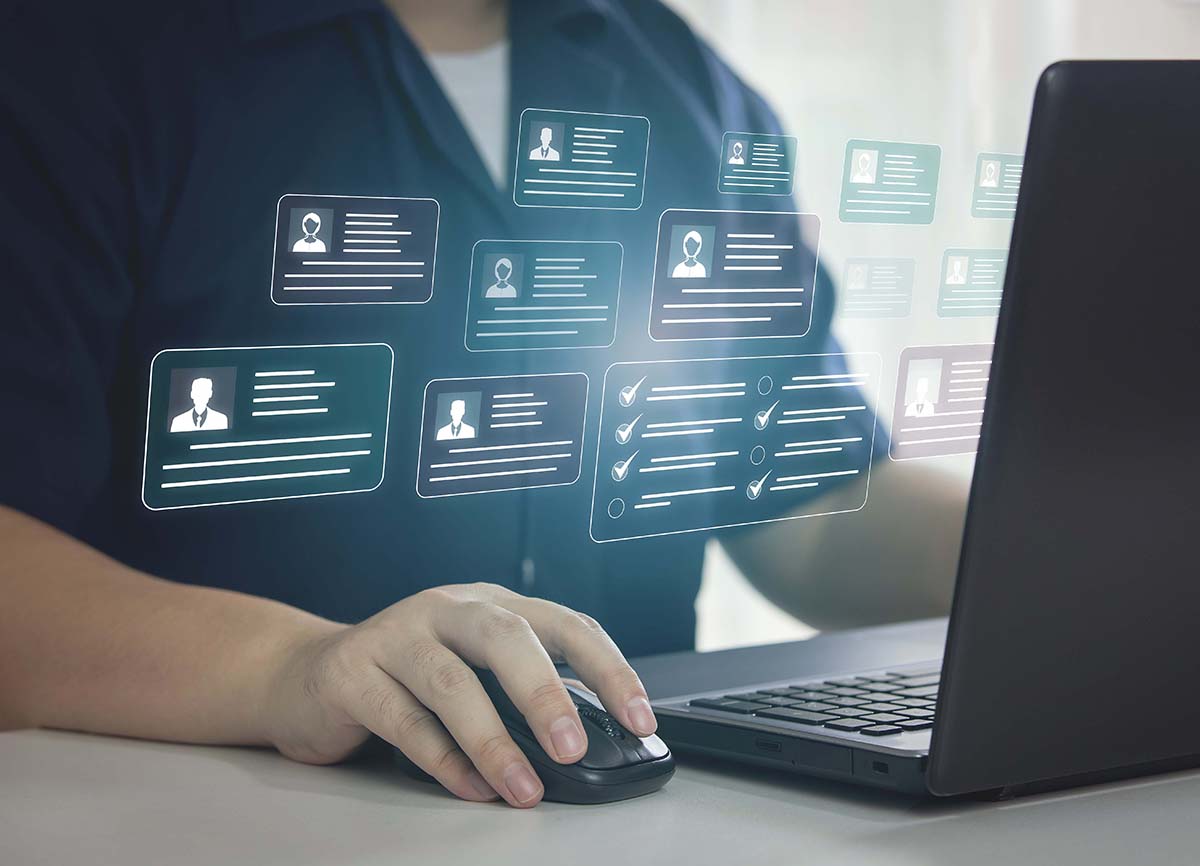 Information management, checklists. Businessman working on a virtual screen from tablet computer.