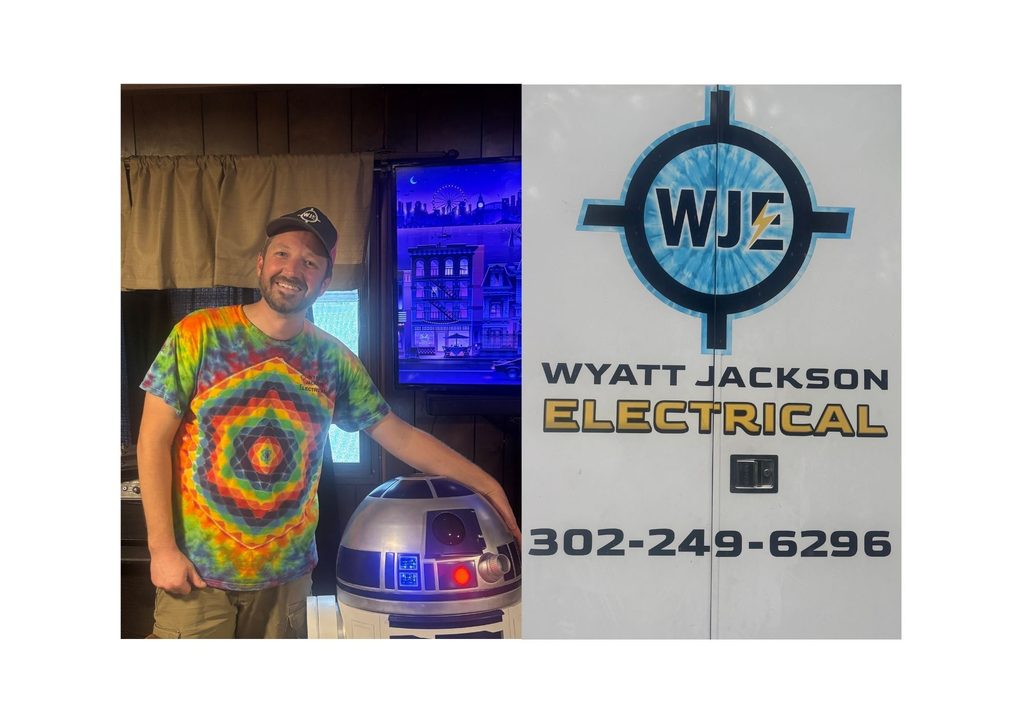 Wyatt Jackson in a Tie-Dye shirt standing next to a robot. On the right, the Wyatt Jackson Electrical logo and phone number.